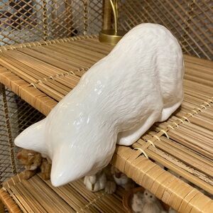 Cat Peaking Over The Edge Porcelain Figurine